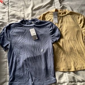 Two high neck cotton shirts
